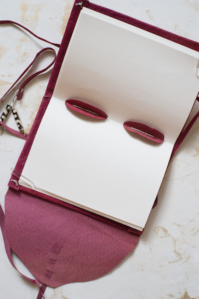 strips of goatskin reinforce the sewn binding